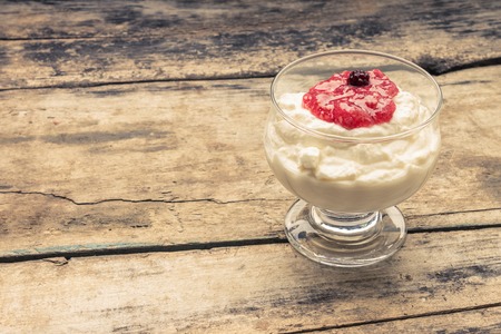 Dairy sweet dessert with strawberry jam and Fresh blueberry
