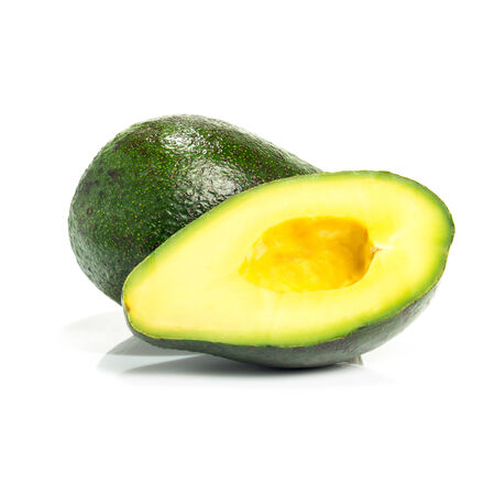 Full and cut in half avocado isolated on white backgroundの写真素材