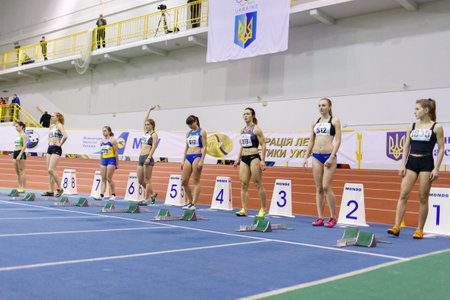 SUMY, UKRAINE - FEBRUARY 17, 2017: Olesya Povkh and other sportswoman before start of 60m sprint...