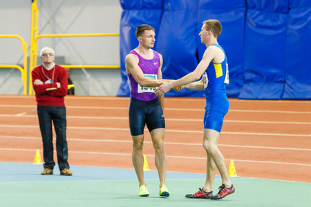 SUMY, UKRAINE - JANUARY 28, 2018: Vitaliy Butrym after win in 400m race on Ukrainian indoor track and field team championship 2018のeditorial素材