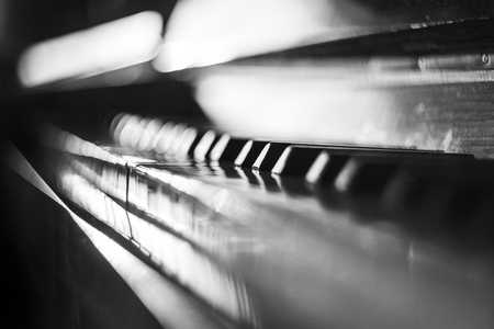 Side view of piano keyboard with shallow depth of fieldの写真素材