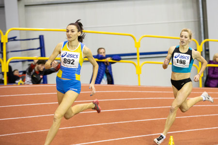 SUMY, UKRAINE - FEBRUARY 20, 2020: Viktoria Nikolenko on her 800m distance Ukrainian indoor track and field championship 2020.のeditorial素材