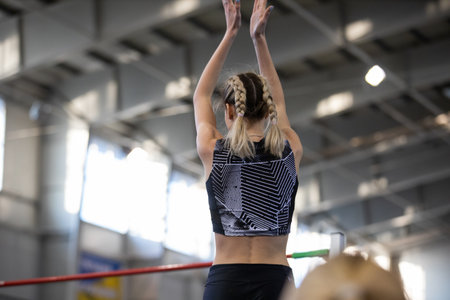 SUMY, UKRAINE - FEBRUARY 22, 2020: Yaroslava Mahuchikh wins in high jump contest at Ukrainian indoor...
