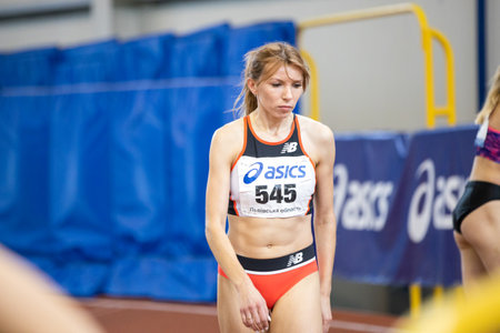 SUMY, UKRAINE - FEBRUARY 22, 2020: Orysya Demyanyuk champion of 1500m final race at Ukrainian indoor track and field championship 2020.のeditorial素材