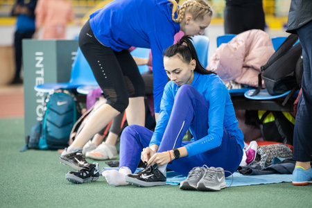 SUMY, UKRAINE - FEBRUARY 22, 2020: Iryna Gerashchenko getting ready to high jump final contest at Ukrainian indoor track and field championship 2020.のeditorial素材