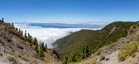 Mountains landscape panoramic view above clouds on Tenerife island, Spainの写真素材