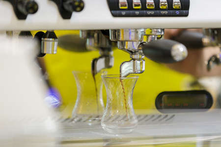 Making espresso with coffee machine at cafe.の写真素材