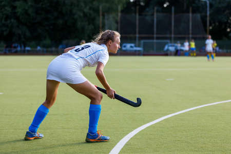 Young field hockey female player waiting for penalty shotの写真素材
