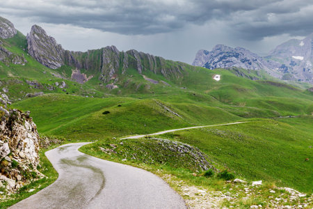 Wet road after storm in Durmitor national park, Montenegroの写真素材