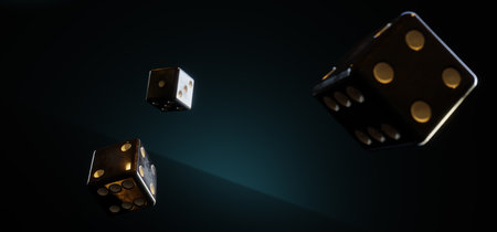 A bunch of thrown dices in warm light against dark backgroundの写真素材