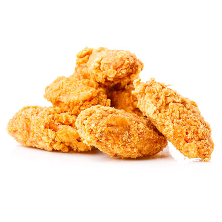 Crispy fried chicken pieces on a white background for food loversの写真素材