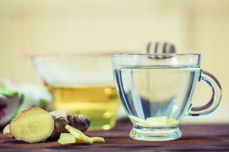 ginger  tea and honey on wooden tableの写真素材