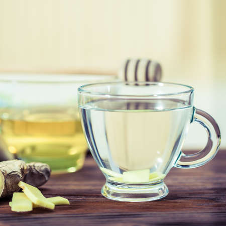ginger  tea and honey on wooden tableの写真素材