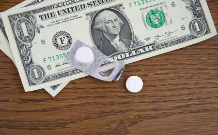Dollar Banknotes and Pillsの写真素材