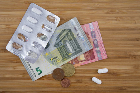Banknotes and Pillsの写真素材