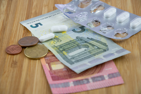 Banknotes and Pillsの写真素材