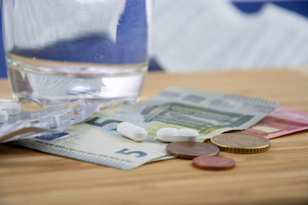 Banknotes and Pillsの写真素材