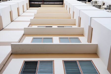 Look up at apartment housing in Thailand. Step of building.の写真素材