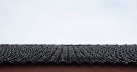 Close up roof texture with blue sky background.