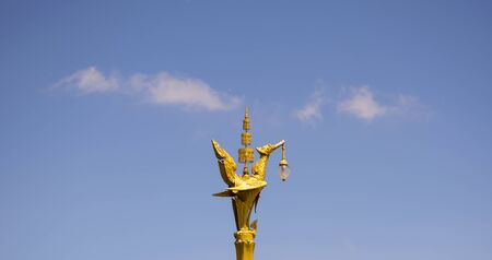 Golden swan or Lantern hanger statue in Thailand. Traditional style lighting lamp of Thai.の写真素材