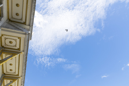 Detail of roof temple' construction with clear sky background at Wat Sothorn, Chachoengsao Thailand