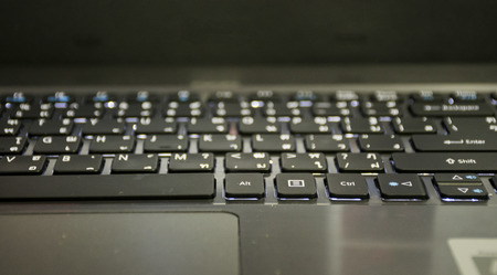 Close up defocus/blur keyboard on laptop. business background concept.