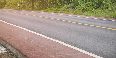 asphalt/concrete road around forest. Travel in Thailand. Hope concept.