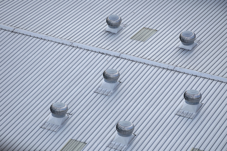 Metal Air ventilator on the roof with top view.の写真素材