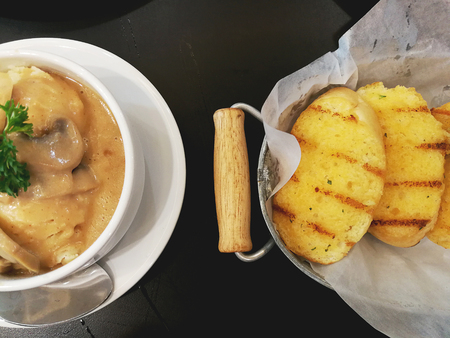 Slices garlic bread and Mashed potatoes in top view.の写真素材