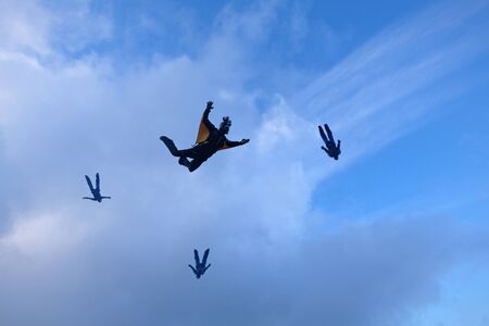 Skydivers are falling in the sky.の写真素材