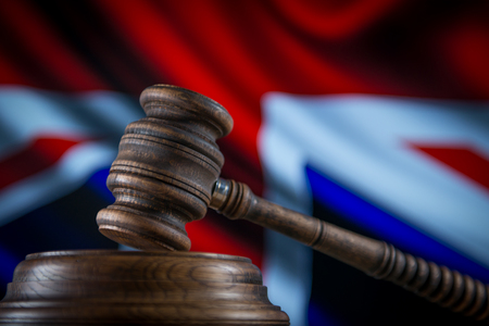 judge gavel and background with uk flagの写真素材