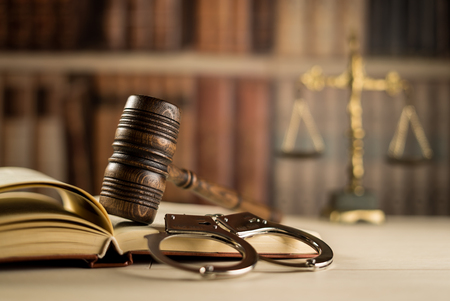 Law symbols. Lawyer theme. Judge wooden gavel.
