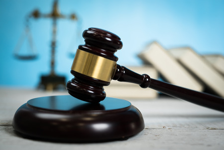 Symbols of the law on a rustic desk