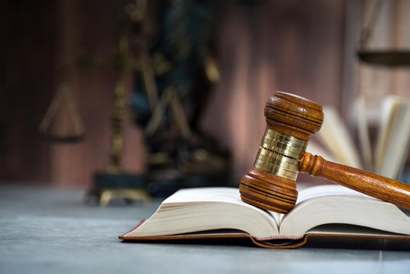 Symbols of the law on a rustic desk