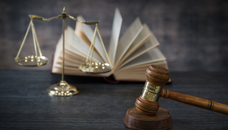Symbols of the law on a rustic desk