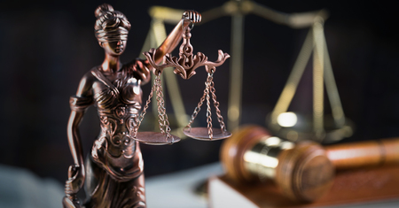 Law and Justice concept with scale and Themis in background. Composition in courtの写真素材