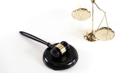 Law and Justice concept with gavel and scale in background. Composition in courtの写真素材