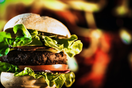 home made fresh tasty burger on wood tableの写真素材