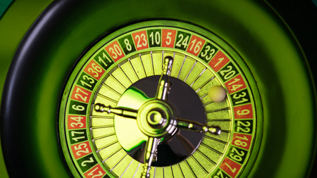 Casino theme. High contrast image of casino roulette, poker game, dice game, poker chipsの写真素材