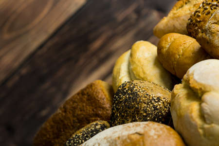 Fresh fragrant bread on the table. Food concept. place for textの写真素材