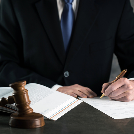 Gavel on wooden table and Courtroom theme, Lawyer or Judgeの写真素材