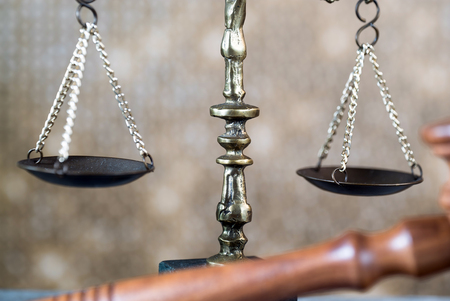 Legal, Law, Legislation Concept. Judge gavel on law books with scales of justice.