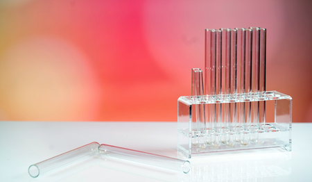 Microscope with lab glassware, science laboratory research conceptの写真素材