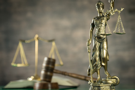 Law and Justice concept. Brown wooden backgroundの写真素材