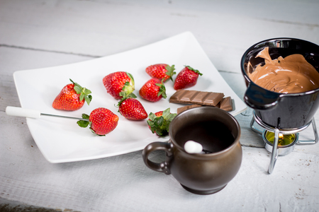 Chocolate fondue with fresh strawberriesの写真素材