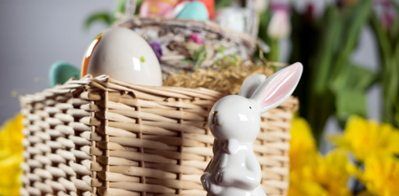 Happy easter. Easter eggs and easter decoration on the wooden table.の写真素材