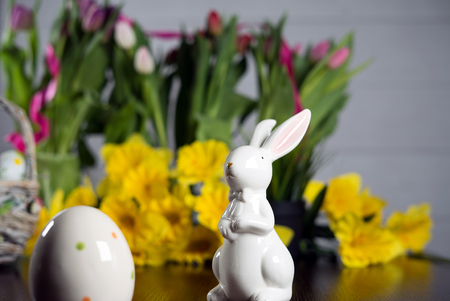 Happy easter. Easter eggs and easter decoration on the wooden table.の写真素材