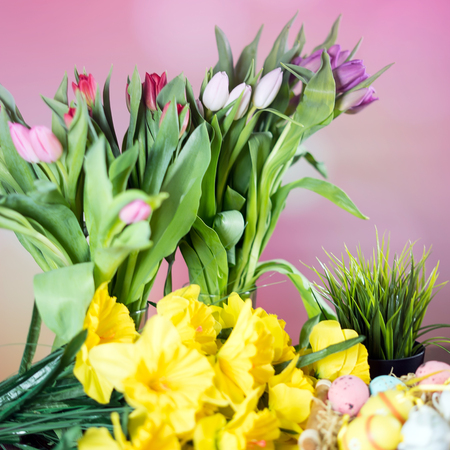 Happy easter. Easter eggs and easter decoration on the wooden table.の写真素材