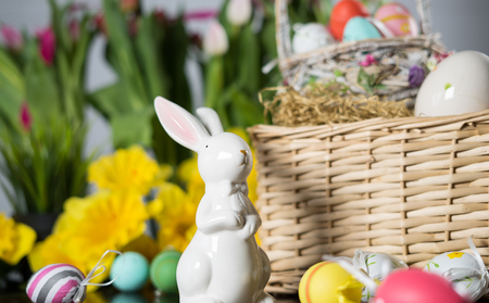 Happy easter. Easter eggs and easter decoration on the wooden table.の写真素材