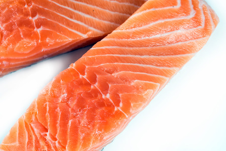 Fillet of salmon isolated on white background